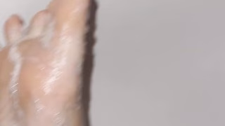 Hot Goth Girl Bubbly Foot Teasing and Scrubbing
