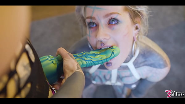 Tattooed Minx Takes Charge in Rough Strap-on Action